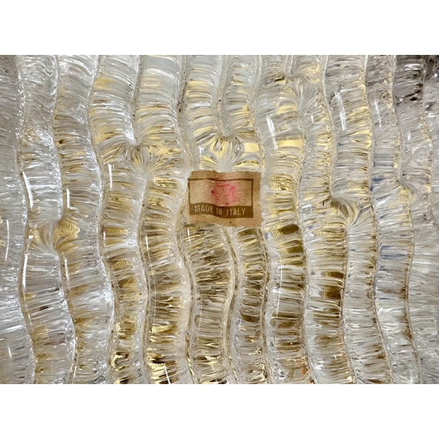 Elegant vintage Novaresi wall lamp with a refined look. This Italian designer lamp combines glass and brass for a timeless...