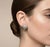 Add a touch of authentic mid-century Italian glamour to your collection with these stunning 1950s "toppe" clip-on...