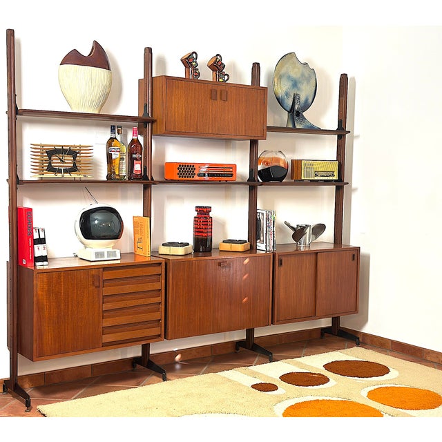 Double-sided modular bookcase with 3 bays from the 1960s. The bookcase is made in Italy, completely restored and...