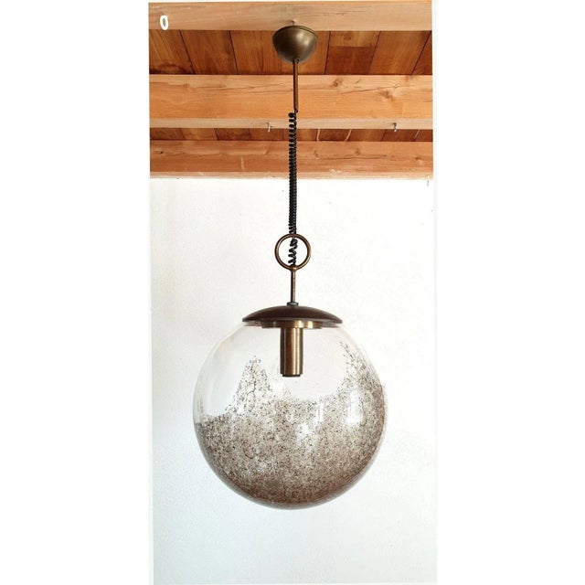 Large Murano glass globe pendant light, attributed to Carlo Nason for Mazzega, Murano, Italy 1960s. The Mid Century Modern...