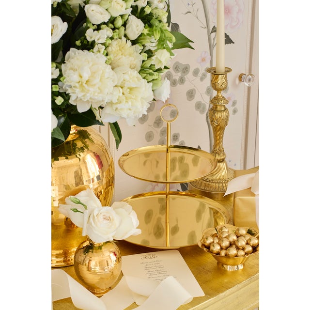 Inspired by a vintage bowl shape and Art Deco Design, this set of two brass bowls, sized for one to sit inside the other,...