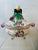 This is an ornate antique-style porcelain covered tureen (or decorative lidded vessel) in a Rococo-inspired form. It...