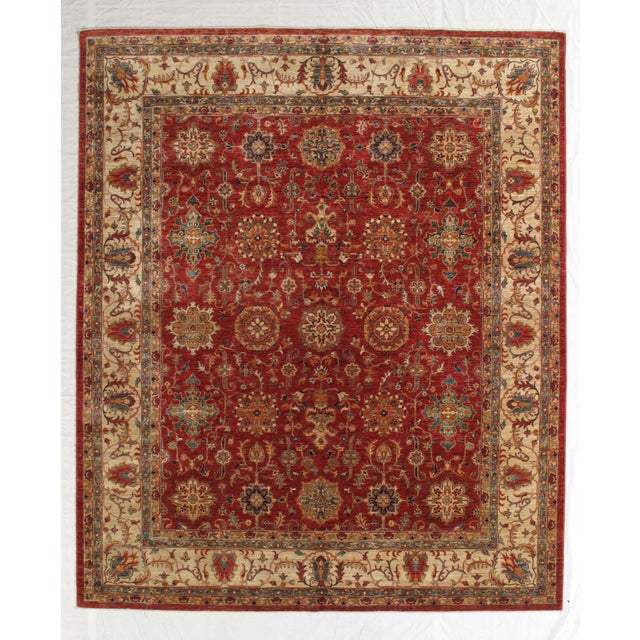 Vintage hand-knotted Lahore rug with an all-over floral design and a defined border. Rugs from Lahore are known for their...