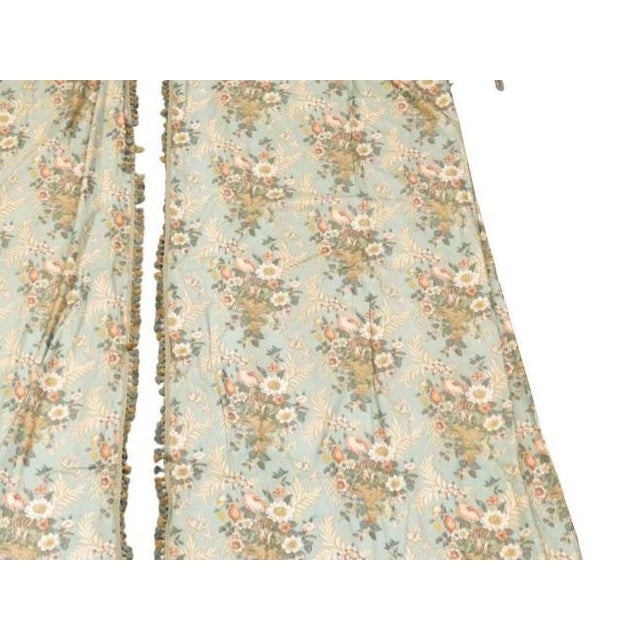 A five-piece set of vintage custom printed cotton valence and drapery panels by GP and J Baker. The two curtain panels in...