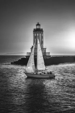 Jason Mageau Intersection, Lighthouse, and Sailboat Photo