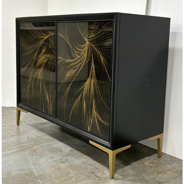 Original retail $2769, stylish Hooker Modern Black and Gold Willow Hall Chest, two doors, one shelf, showroom floor sample