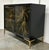 Original retail $2769, stylish Hooker Modern Black and Gold Willow Hall Chest, two doors, one shelf, showroom floor sample