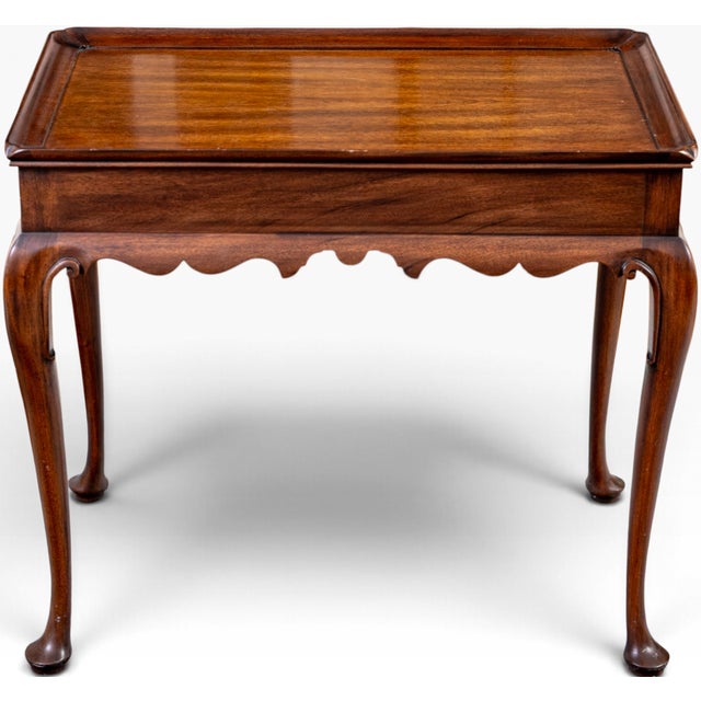 Vintage Henkel Harris Queen Anne Mahogany Tea Table with Candle Slides An exceptional vintage Queen Anne-style tea table...