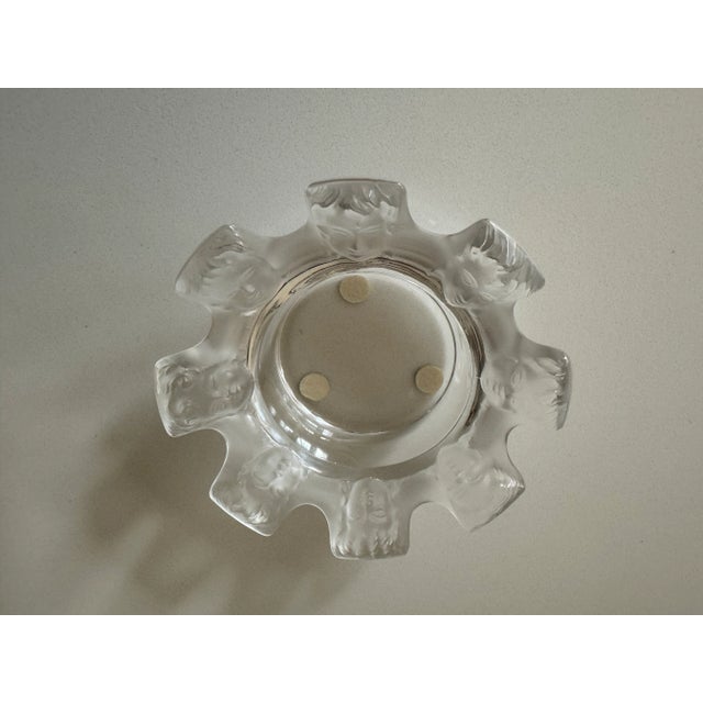 Rene’ Lalique French crystal tray with eight deco faces. Satin and transparent finish Three felt pads protect the...