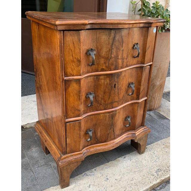 Charming chest of drawers from the first half of the 18th century, like a bedside table with 3 drawers. The front of the...
