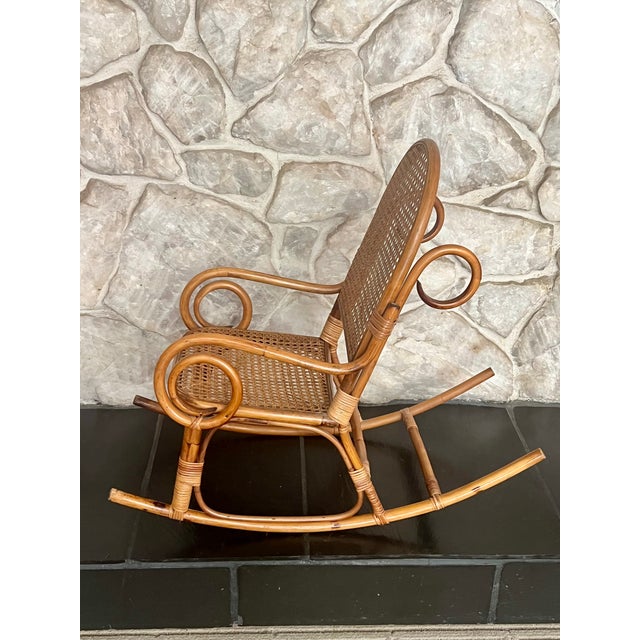 Vintage Thonet-Style Bentwood & Cane Children's Rocking Chair 26"H x 13"W Arm Height: 14"H Seat Height: 10"H Cane is in...