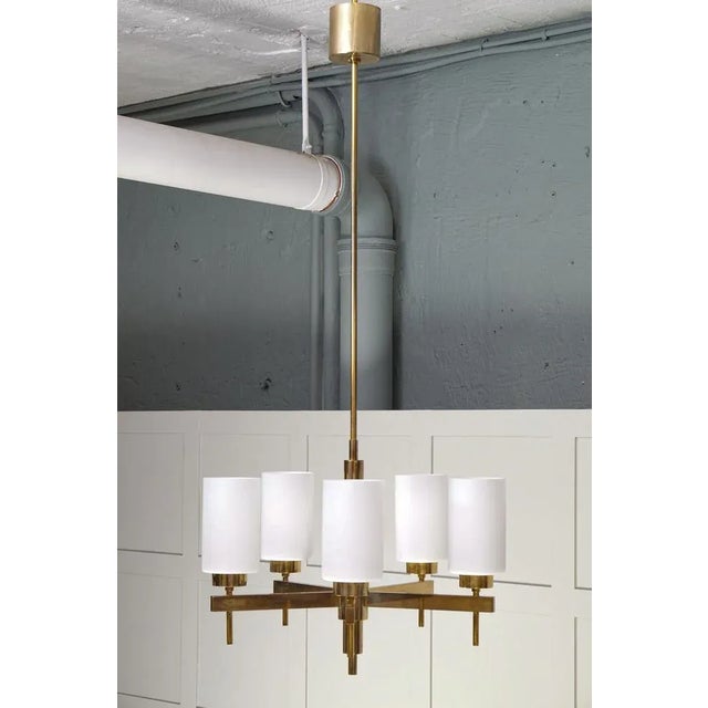 Opaline glass and brass. Designed by Hans-Agne Jakobsson and produced by Hans-Agne Jakobsson AB in Markaryd, Sweden,...