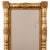 A Sheraton giltwood mirror, circa 1830. A split baluster frame with rosette corner blocks. sight: 11 ½ by 30 inches frame:...