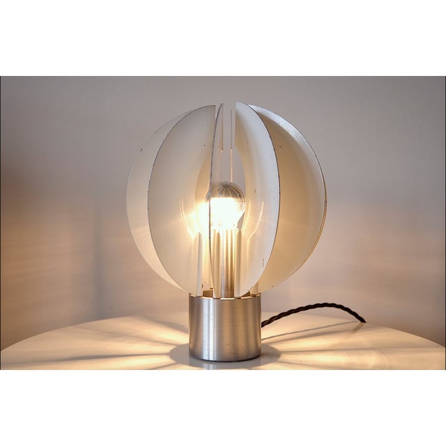 Very rare italian space age table lamp by ezio zanobini for t2 from the 1960s. This table lamp is the spicchio model –...