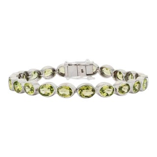 Oval Cut Peridot Gemstone Tennis Bracelet in 925 Sterling Silver by Caratandher For Sale