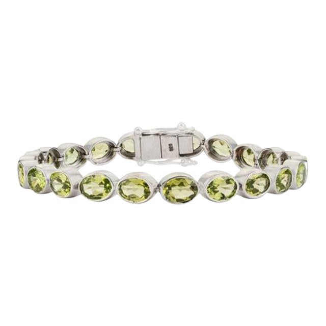 Oval Cut Peridot Gemstone Tennis Bracelet in 925 Sterling Silver by Caratandher For Sale
