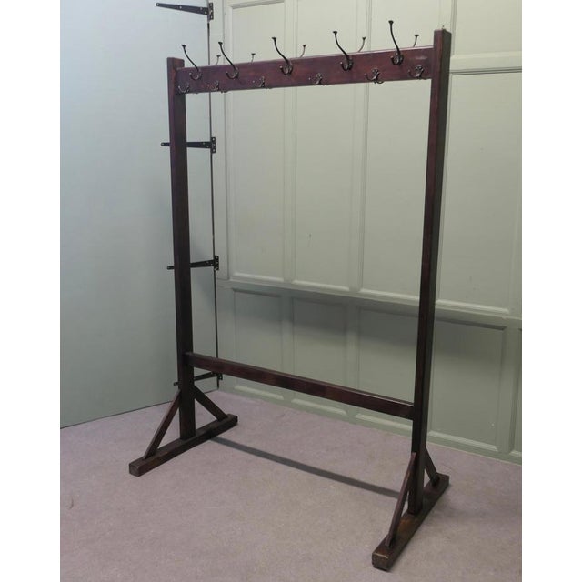 Double Sided Arts & Crafts Hanging Rail The Cloakroom Rail is a well designed piece it has a total of 10 large iron coat...