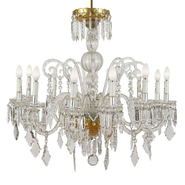 Antique Bohemian Crystal Chandelier with 12 Arms. An elegant twelve-light Bohemian crystal chandelier dating back to...