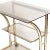This Italian Mid-Century Modern 1970s bar cart or occasional table or console, in gilt brass, features 3 crystal 'fumè'...