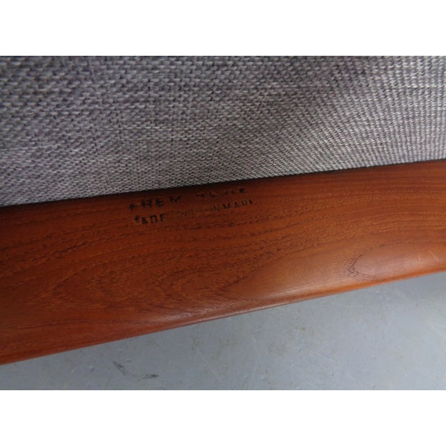 Hans Olsen designed this ottoman in the 1960s. It was manufactured by Frem Røjle in Denmark. This piece has an attribution...