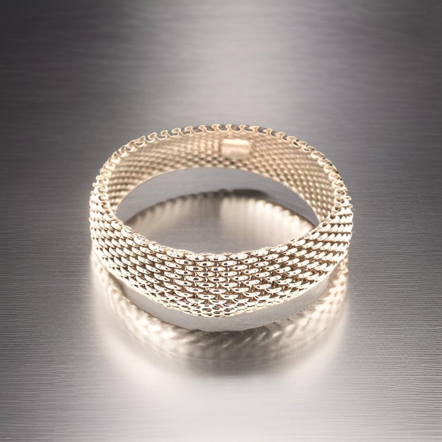 AuthenticTiffany & Co Somerset Bangle M 7.5" Sterling Silver 17 mm Estate TIF941 This elegant Authentic Tiffany bracelet...