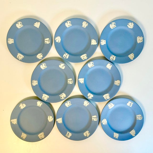 Traditional English Wedgwood appetizer/dessert plates in the iconic Pale French Blue ceramic. Each plate features a group...