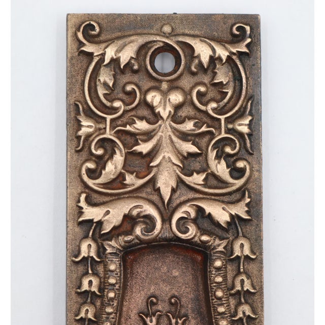 Antique Victorian style recessed pocket door pull made by Russell & Erwin in 1894. It is known as the Bavarian design. It...