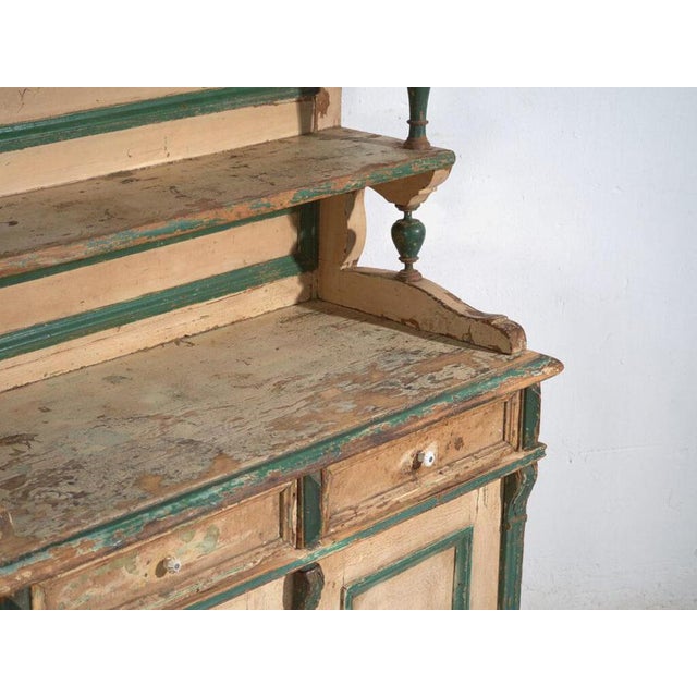 Tall wardrobe in solid pine, with two doors and interior shelves, originally from central europe and dated to the early...