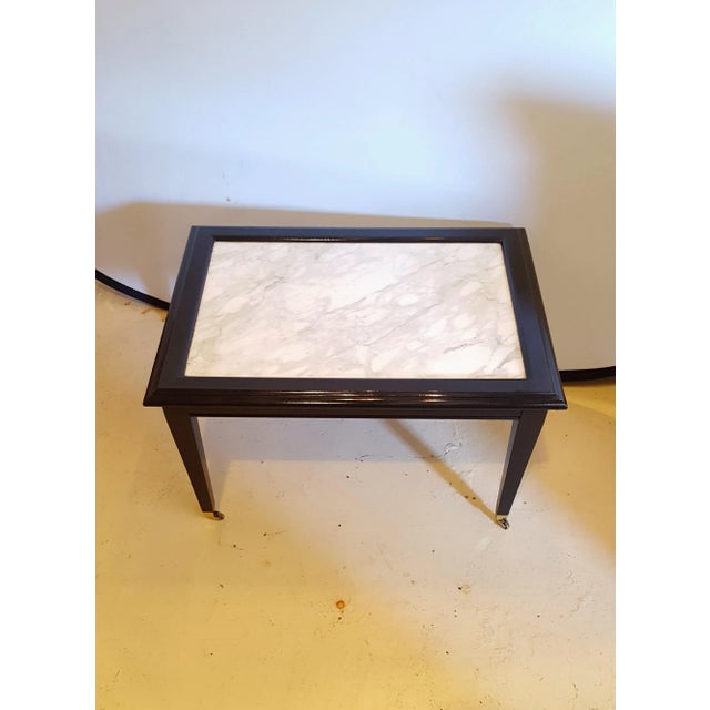 Neoclassical Ebonized Marble Top Coffee Table / Cocktail Table on Wheels Manner of Jansen For Sale - Image 3 of 6