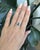 An elegant 2CT blue lab diamond shines with striking brilliance, framed by natural diamond accents for a refined contrast....