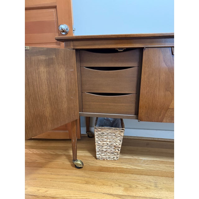 1960's Mid-Century Modern Mount Airy JANUS Bar Cart-Sideboard. Made in North Carolina, this walnut bar cart has triangle...