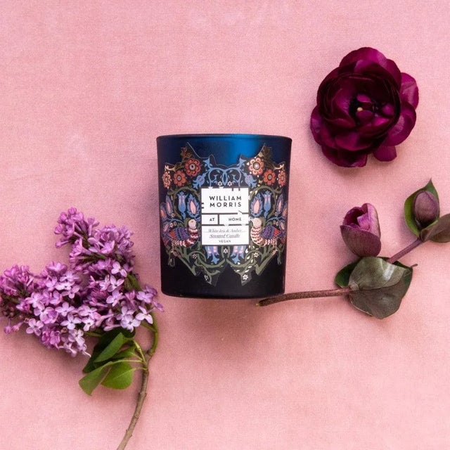 Bring a tranquil mood into your home with this exquisite White Iris & Amber scented candle, infused with warm and soothing...