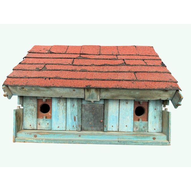A wonderful example of American folk-art craftsmanship, this mid-century birdhouse is built almost entirely from reclaimed...