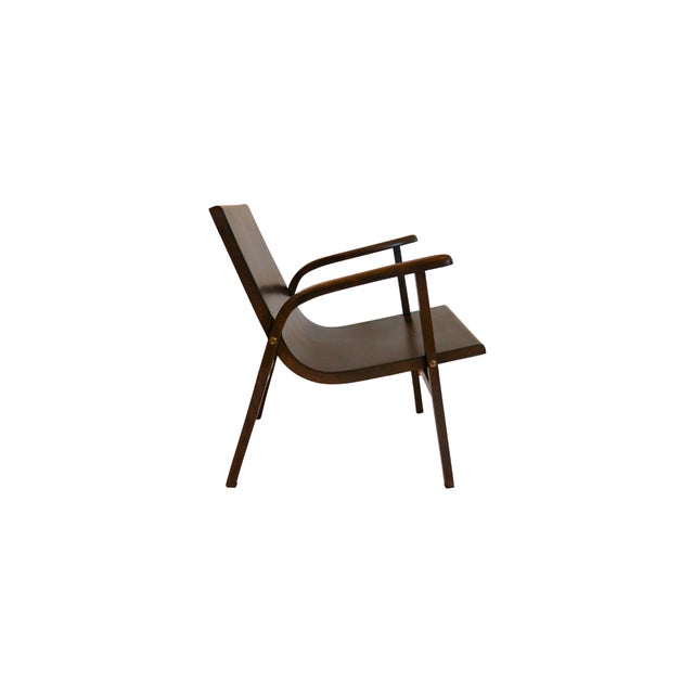 A midcentury lounge chair designed by Roland Rainer for the "Cafe Ritter" in Vienna, Austria, in 1952 and manufactured by...