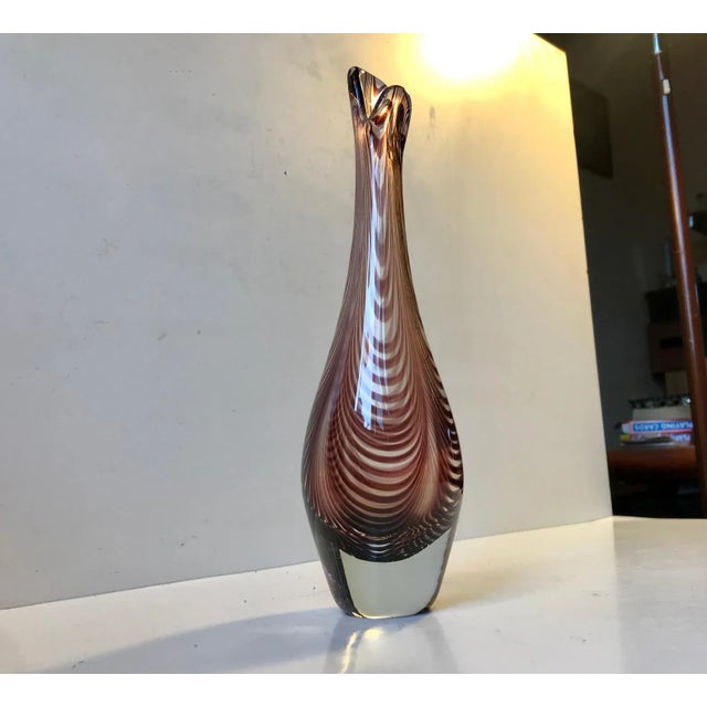 Duckling art Glass vase in driven/swirl glass. The design is for obvious reasons called the Duckling Vase and resembles...