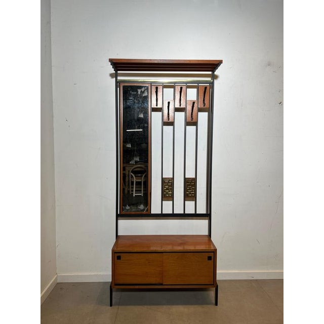 Stunning vintage mid-century modern hall stand combining functionality with strong architectural design. This elegant...