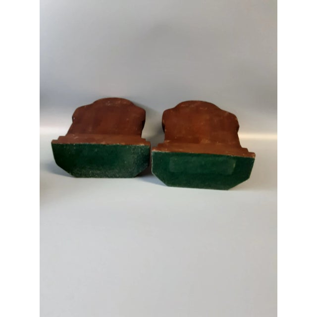 Adorable handcarved wooded Basset Hound faces. Unsigned, green felt bottoms. Book not included.