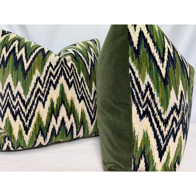 Custom pair of 22" pillows covered in Thibaut "Rhythm Velvet" in color emerald/navy and backed in a coordinating velvet....