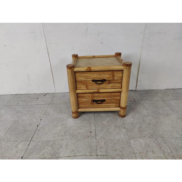 Elegant two drawer bamboo bedside cabinet. 1970s - France Dimensions: Height: 47cm/18.50" Width: 60cm/23.62" Depth:...