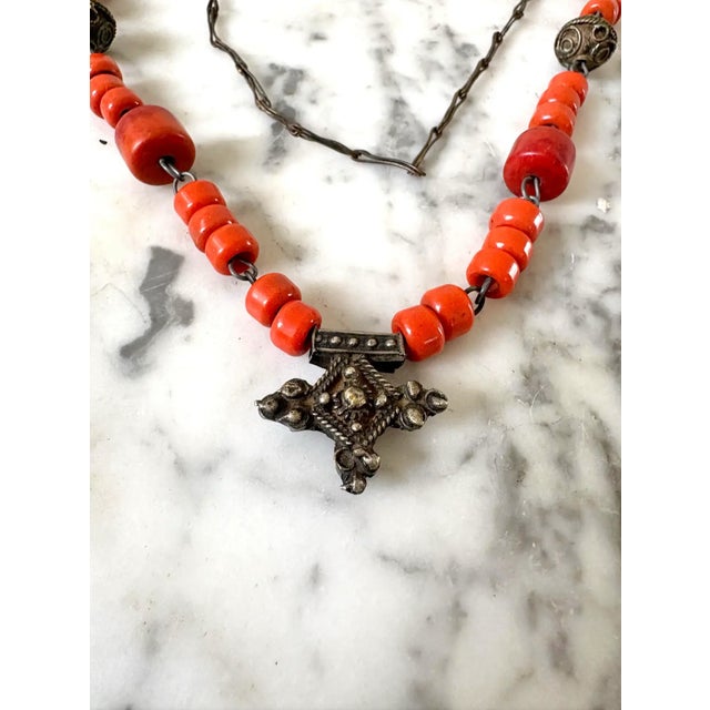 This necklace is characteristic of Berber craftsmanship from North Africa, particularly Morocco and Mauritania, known for...
