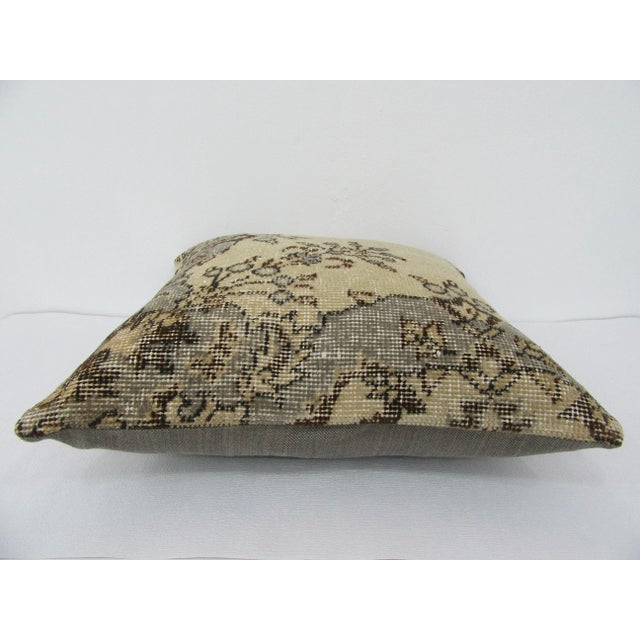 This is a pillow cover made from a vintage kilim rug. The piece was properly washed and ready to use. Pillow inserts not...