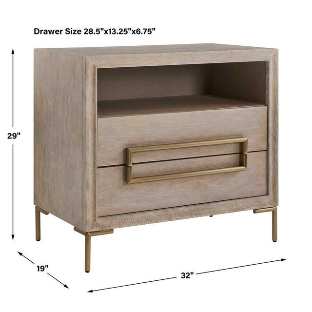 Showcasing a cerushed light oak finish This bedside table exhibits a strong contempoaray aesthetic that adds a touch of...