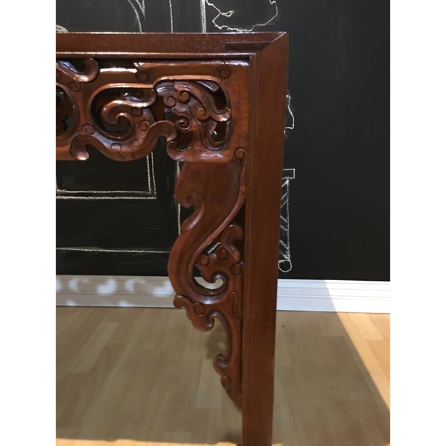 Unique 1980's bloodwood dragon carved stained foyer table.