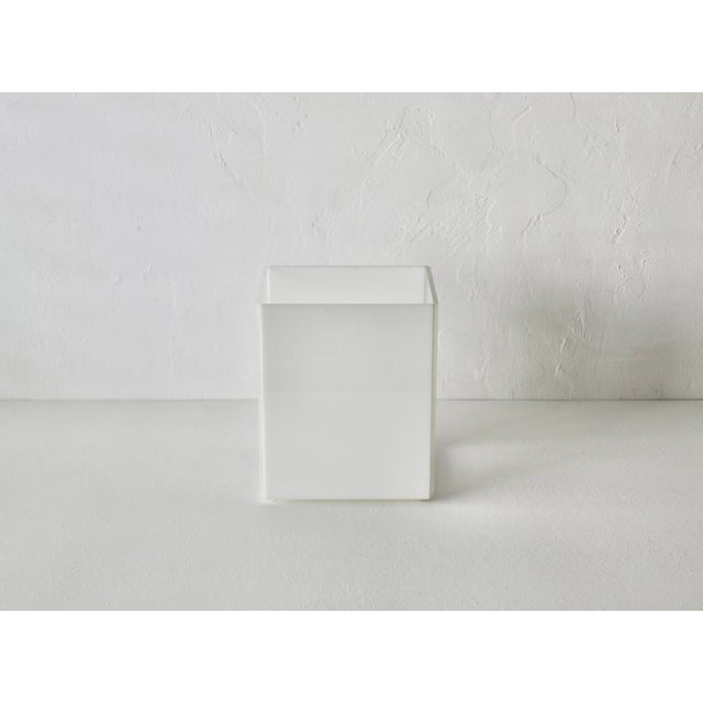 Vintage Tizo Style White Lucite Acrylic Waste Basket, with beveled edges and floor bumpers. In good vintage condition with...