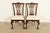 An outstanding pair of Chippendale or Georgian style side chairs or dining chairs By Drexel Heritage USA, 1992 Carved...