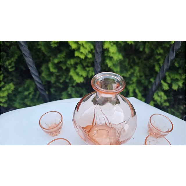 Rosaline glass decanter and 6 glasses, Art Deco, 1930s, dimensions: height 16.5 cm, diameter at the widest point 10 cm;...