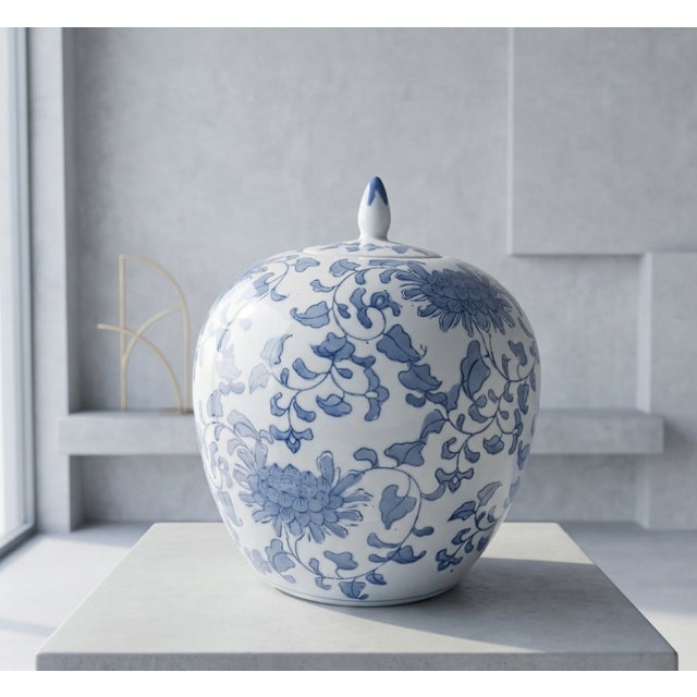 Blue and white porcelain lidded ginger jar. Featuring a classic high-shouldered, oviform body, the jar is beautifully...