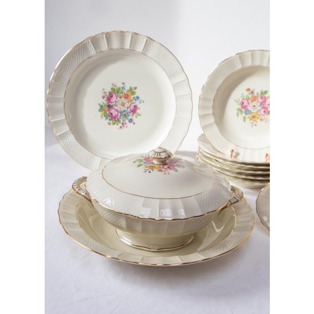 The set consists of the following 11 pieces: 6 soup plates (23.5 cm diameter) 1 relish dish (23 x 12.5 cm) 1 oval platter...