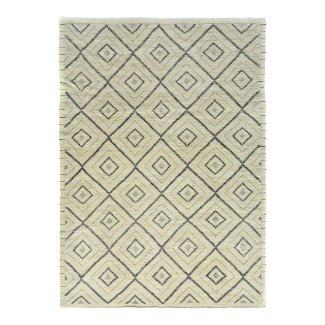 Contemporary Moroccan Handcrafted Wool Rug Featuring a Geometric Design in Beige and Blue For Sale