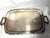 A handsome vintage silverplate butler's tray by Oneida, featuring a generously proportioned rectangular surface,...